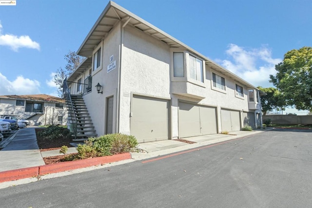 view of building exterior with a garage