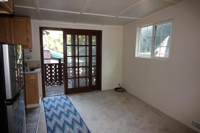 entryway featuring carpet