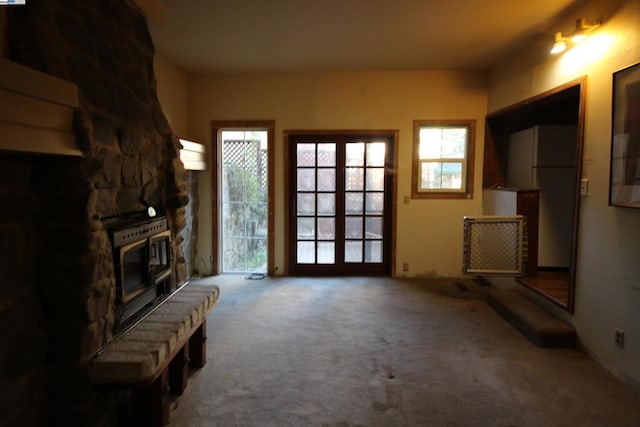 living room with french doors and carpet floors