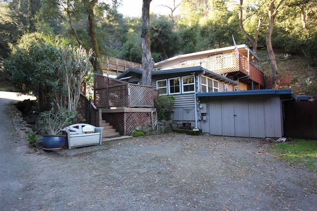 rear view of house with a deck