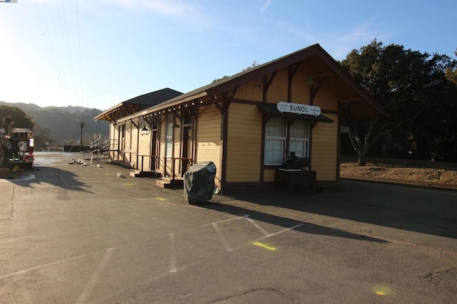 view of building exterior with a mountain view