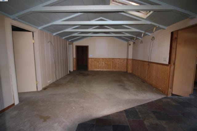 interior space featuring wooden walls