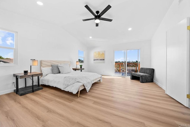 bedroom featuring lofted ceiling, ceiling fan, and light hardwood / wood-style flooring