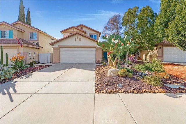 mediterranean / spanish-style home featuring a garage