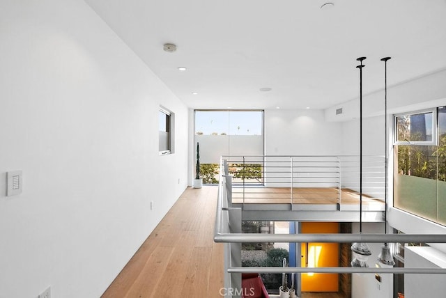 hallway featuring light hardwood / wood-style flooring