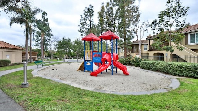 view of play area featuring a lawn