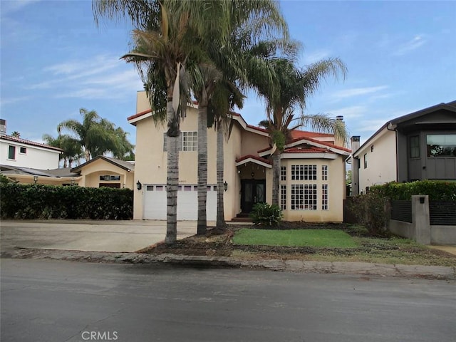 view of front of home with a garage