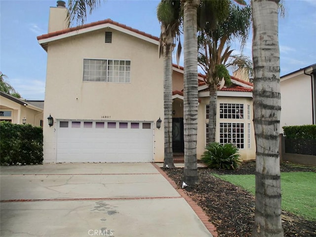 view of front of property featuring a garage