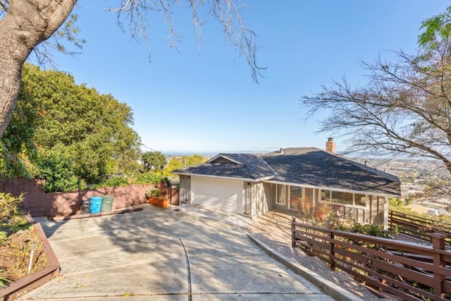 single story home with a garage