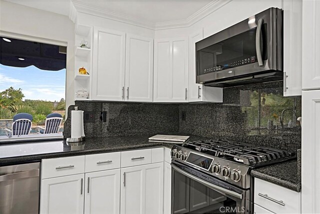 7230 Sarsaparilla Dr, Corona, CA 92881 - kitchen with appliances with stainless steel finishes, white cabinets, backsplash, open shelves, and crown molding