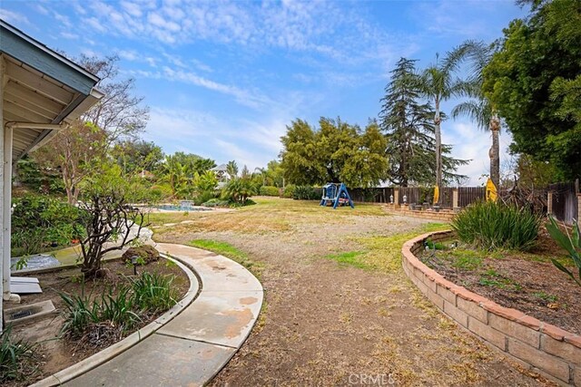 7230 Sarsaparilla Dr, Corona, CA 92881 - view of yard with a playground