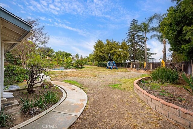 7230 Sarsaparilla Dr, Corona, CA 92881 - view of yard with a playground