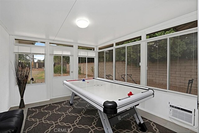 7230 Sarsaparilla Dr, Corona, CA 92881 - game room with dark tile patterned flooring and baseboards