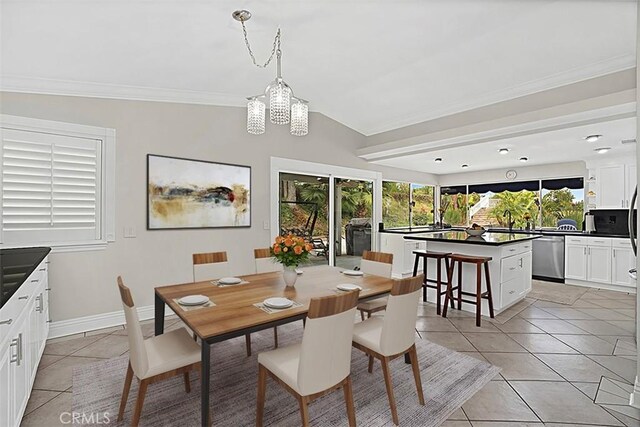 7230 Sarsaparilla Dr, Corona, CA 92881 - dining area featuring light tile patterned floors, a chandelier, crown molding, and baseboards