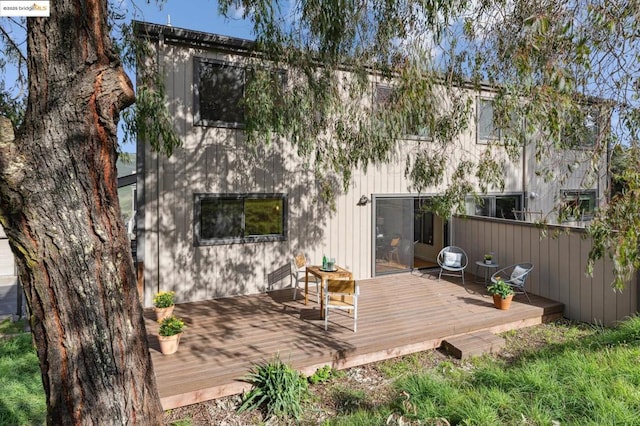 rear view of house with a deck