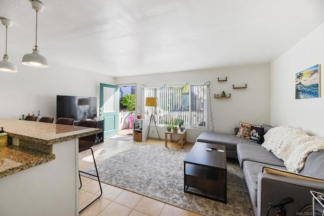 living room with light tile patterned floors