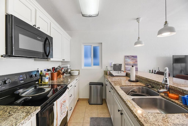 kitchen with white cabinetry, pendant lighting, sink, and black appliances