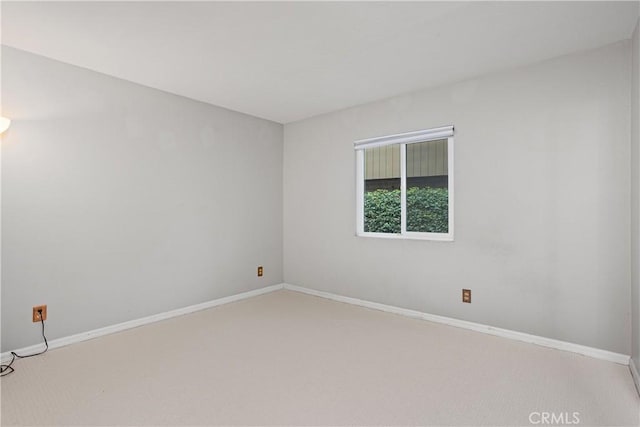 unfurnished room with carpet