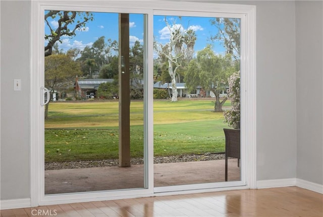 doorway to outside featuring hardwood / wood-style floors