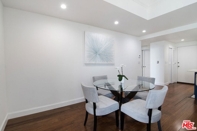 dining space featuring dark wood-type flooring