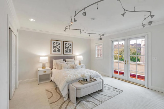 bedroom with ornamental molding, access to outside, light colored carpet, and french doors