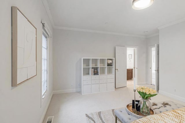 interior space featuring crown molding and light colored carpet