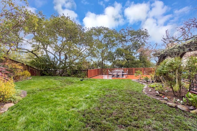 view of yard featuring a deck