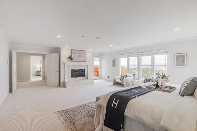 carpeted bedroom with crown molding and a premium fireplace