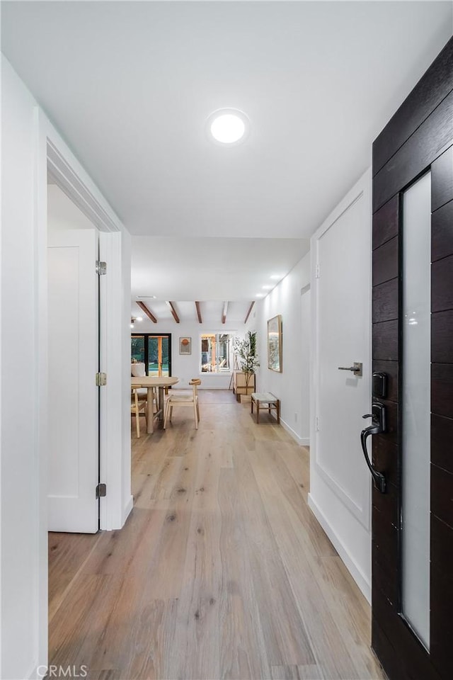 hall featuring light hardwood / wood-style flooring