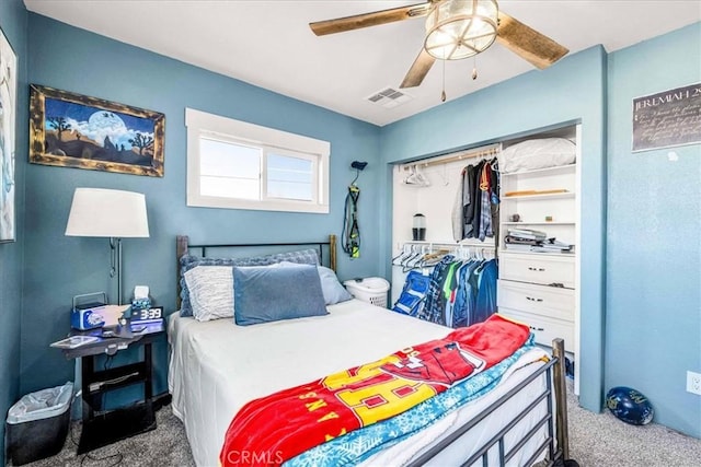 bedroom featuring carpet floors, a closet, and ceiling fan