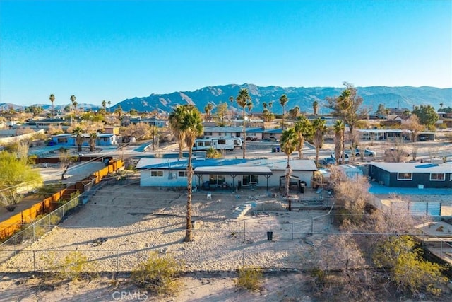 drone / aerial view featuring a mountain view