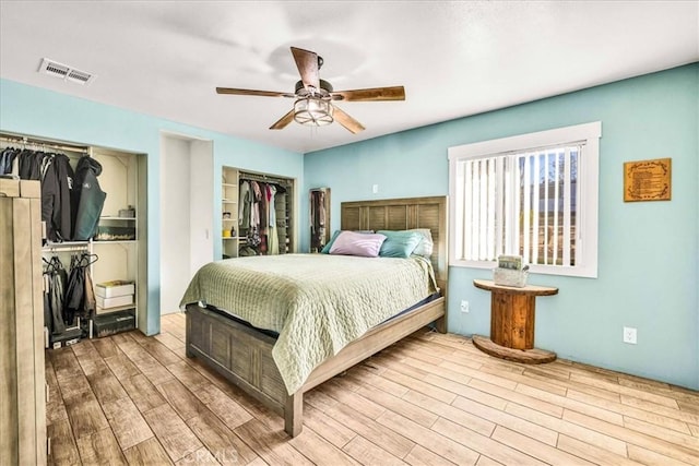 bedroom featuring ceiling fan and wood-type flooring