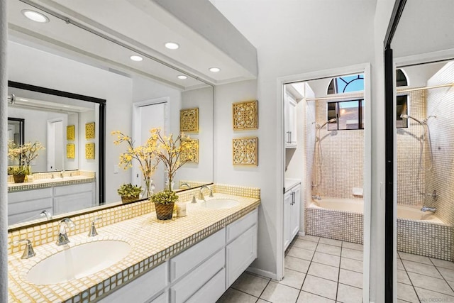 bathroom with tile patterned floors and vanity