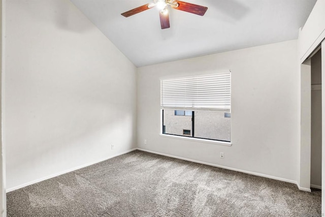 unfurnished bedroom with vaulted ceiling, carpet flooring, and ceiling fan