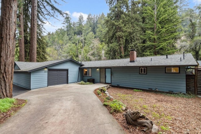 ranch-style home with a garage