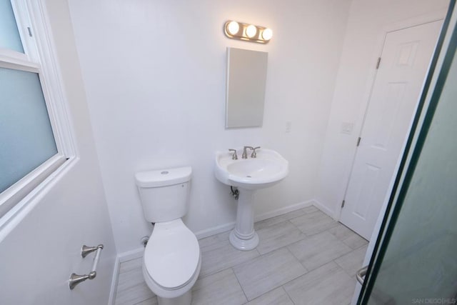 bathroom featuring toilet