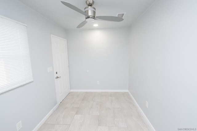 spare room with ceiling fan