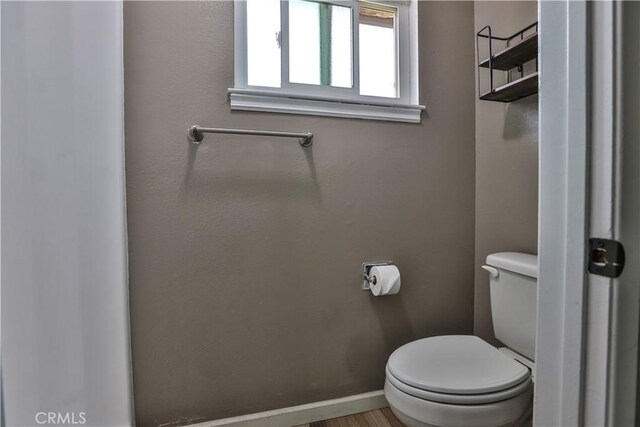 bathroom featuring toilet