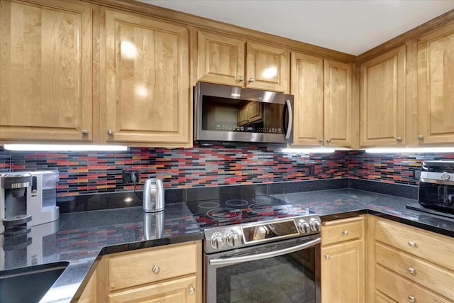 kitchen with tasteful backsplash, stainless steel appliances, and light brown cabinetry