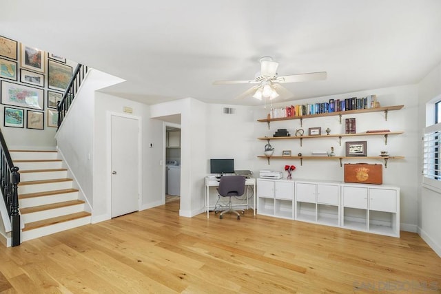 office with ceiling fan and light wood-type flooring