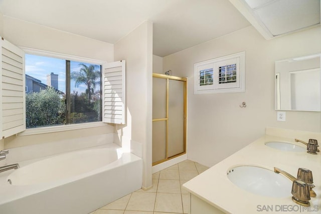 bathroom featuring tile patterned flooring, vanity, and independent shower and bath