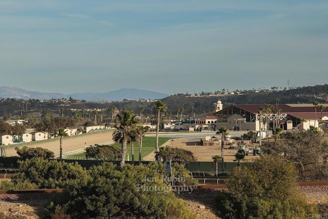 surrounding community with a mountain view