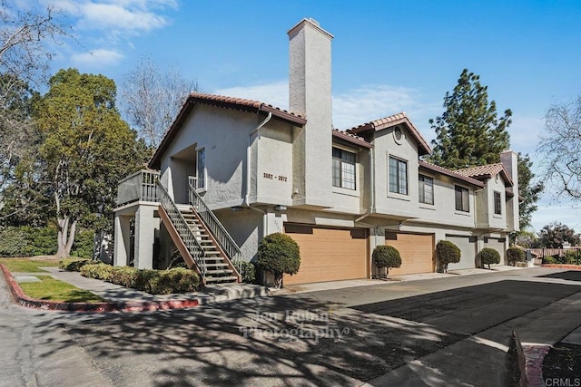 exterior space with a garage