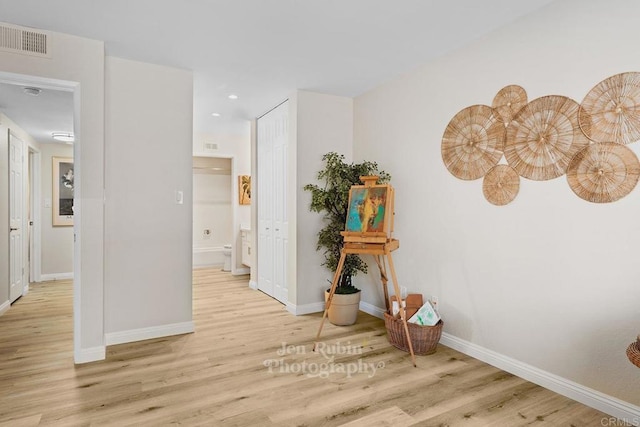 hall featuring light hardwood / wood-style flooring