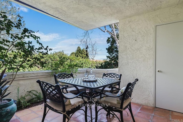 balcony featuring a patio area