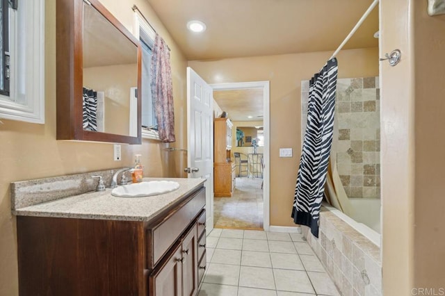 bathroom featuring vanity, tile patterned floors, and shower / bathtub combination with curtain