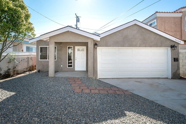 ranch-style house featuring a garage