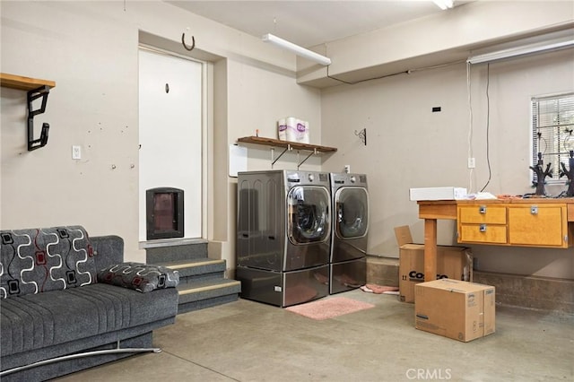 laundry area with separate washer and dryer