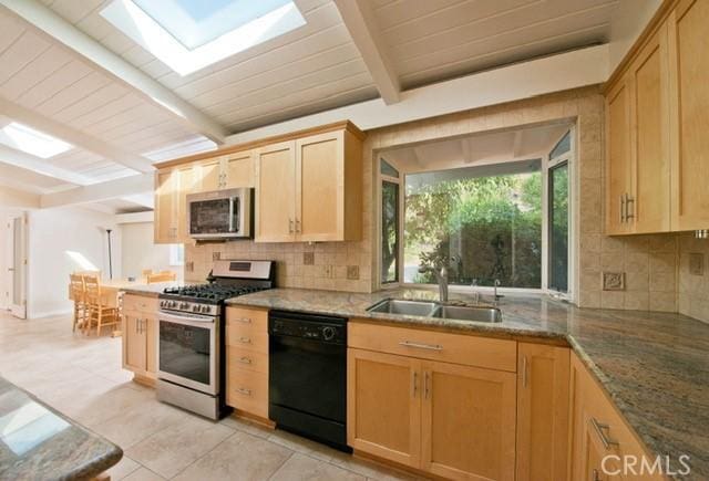 kitchen with sink, appliances with stainless steel finishes, beam ceiling, light brown cabinetry, and decorative backsplash