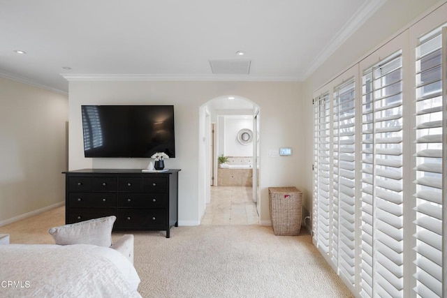 carpeted bedroom with crown molding